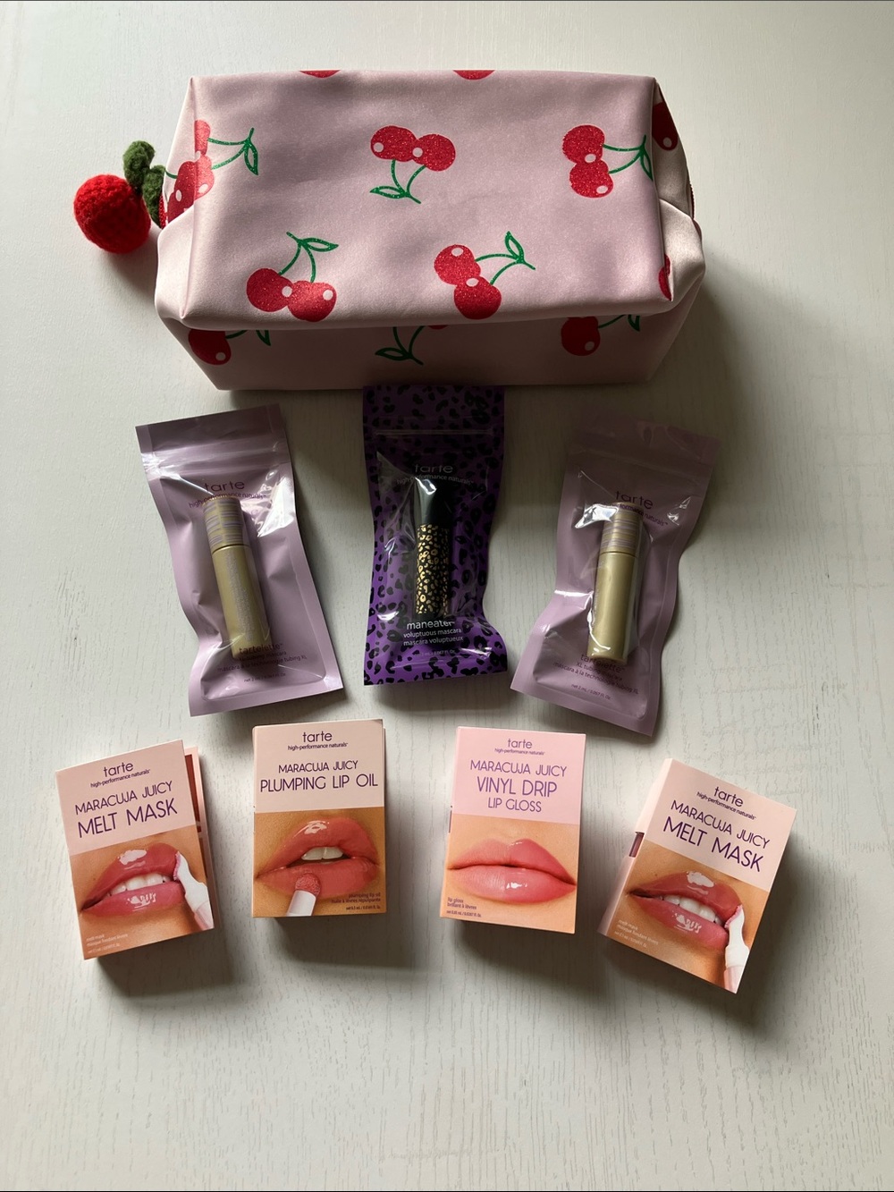 Tarte 7 Piece Set (Travel Size)  + Cherry Fabric Cosmetic Bag